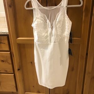 White dress new with lace and mesh detail